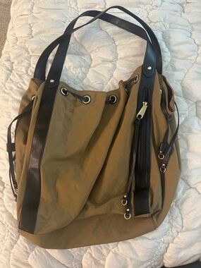 Rebecca Minkoff M.A.B. Nylon Drawstring Tote Bag in a military green col